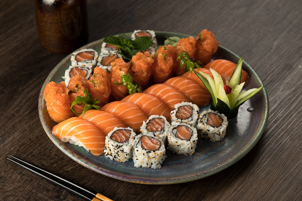 A colorful New Hope Sushi selection arranged on a ceramic plate